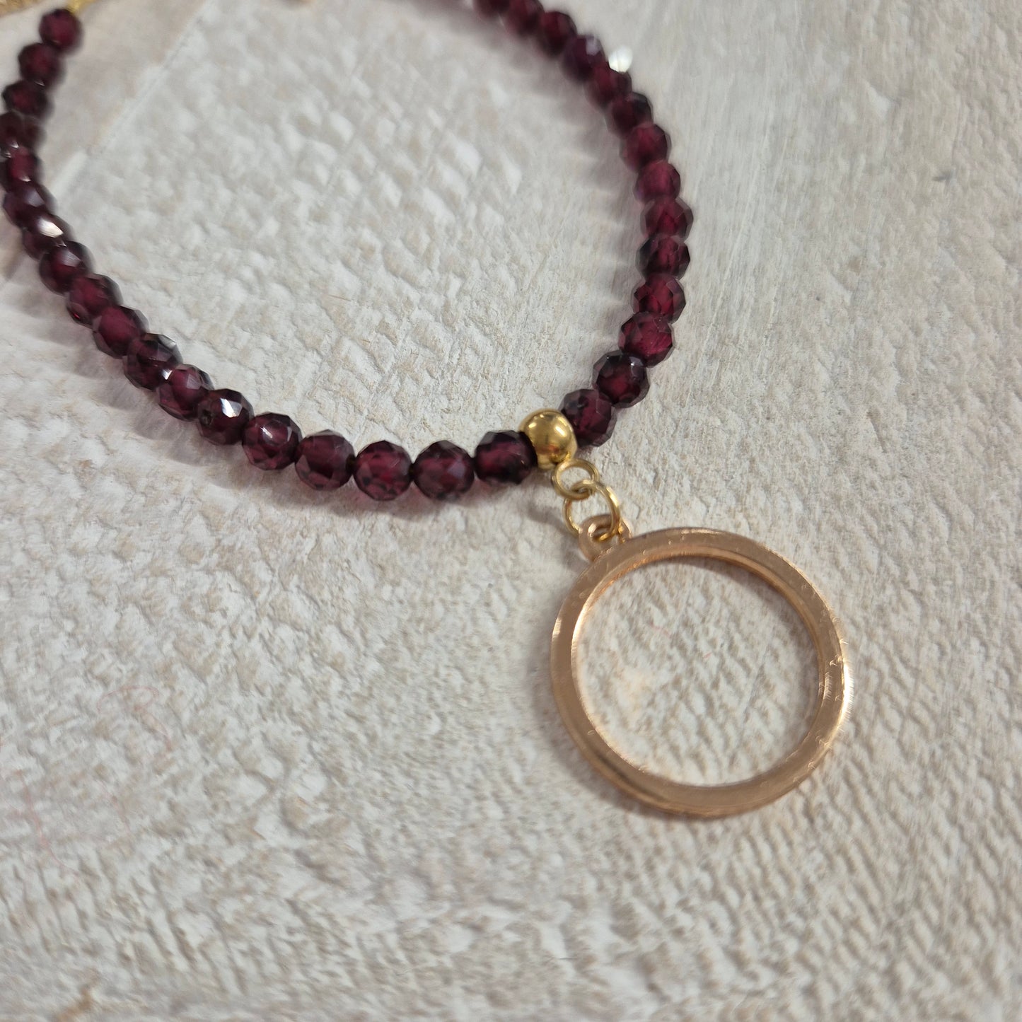 Gold & Garnet Gemstone Circle Charm Bracelet