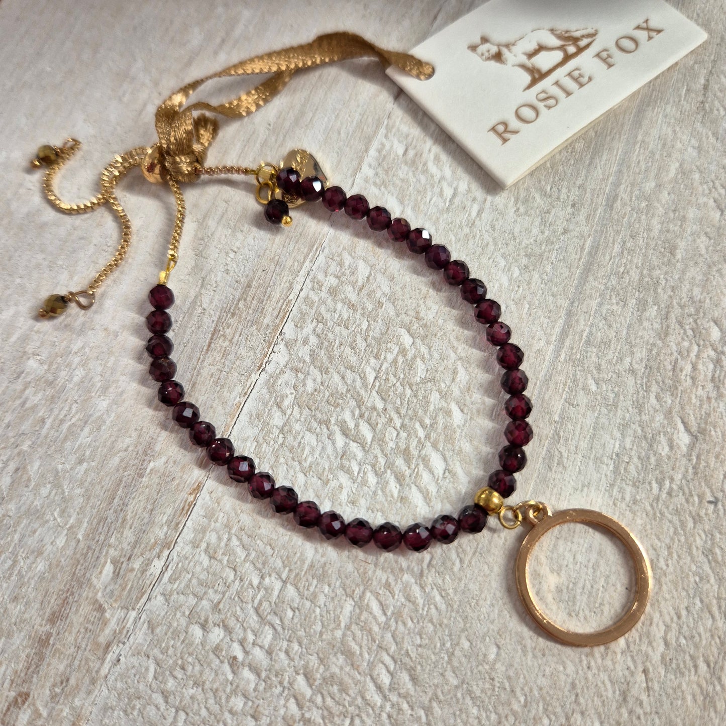 Gold & Garnet Gemstone Circle Charm Bracelet